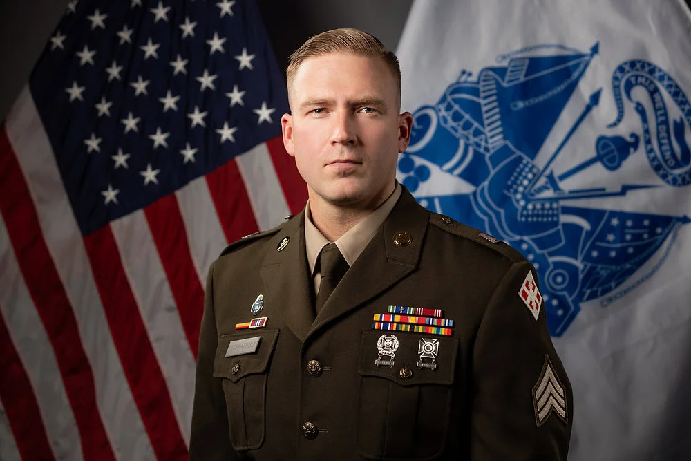 Officer, Justin Adam